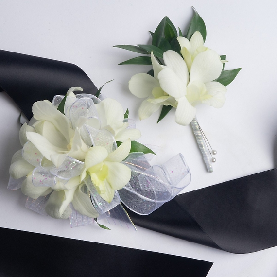 White Dendrobium Orchid Corsage & Boutonniere arranged by a florist in  Jacksonville, FL | Kuhn Flowers